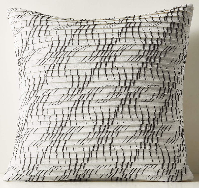 Cojín Blanco Cálido y Negro